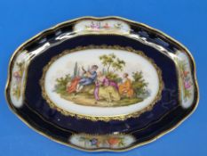 A 19thC Meissen oval platter decorated w