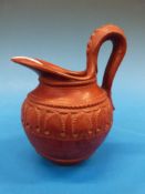 A reproduction Roman redware jug
