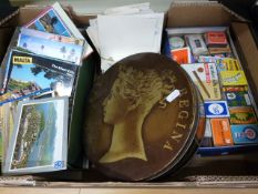 A shoe box containing a collection of 20