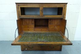 A secretaire (probably fruitwood) with c