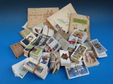 A box of cigarette cards including John