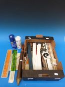 An architect's slide rule, together with