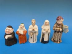 Five various candle snuffers in the form