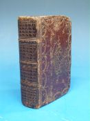 A pocket sized leather bound Book of Com