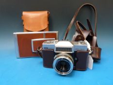 A Polaroid SX-70 land camera and a Rank