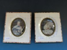 A pair of miniatures on ivory in ivory a