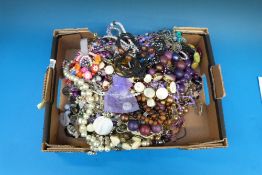 A collection of beads, necklaces, bracel