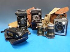 Three vintage cameras including Brownie,