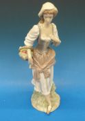 A Lladro figurine, Girl with Basket 4665