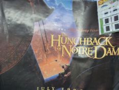 Four Disney film posters comprising The