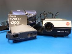 A Polaroid 1200 si camera and a Leica pr