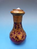 A cranberry glass scent bottle with engr