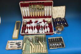 A cased set of six silver spoons togethe