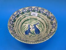 A studio pottery bowl with decoration of