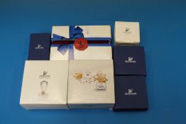 Seven Swarovski Collectors Society Cryst