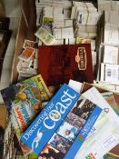 A large collection of cigarette cards an