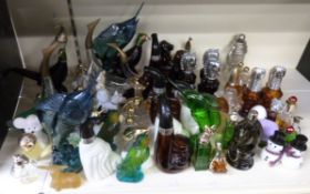 A large quantity of Avon perfume bottles
