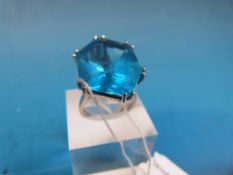 A white metal ring marked 750 set with a