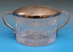 A silver plated and cut glass twin-hande