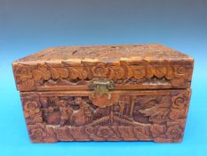 A carved Chinese camphor wood box