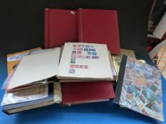 A crate of all world stamps, loose and i