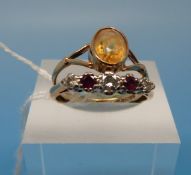 A 9ct gold ring set with diamonds and ru