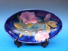 A Moorcroft oval pedestal dish in Magnol