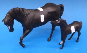 A Beswick horse and foal in matt black