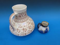 A Doulton Burslem jug with butterfly and