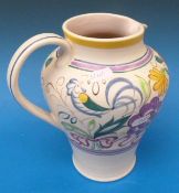 A large Poole pottery jug, 22cm tall
