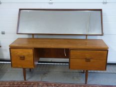 A retro G Plan dressing table with mirro