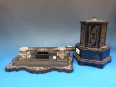 A novelty revolving musical cigarette di