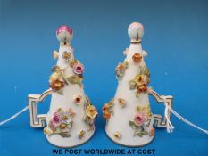 A pair of 19thC Meissen candle snuffers