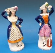 A pair of Staffordshire castanet players