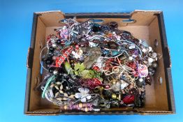 A collection of beads, necklaces, bracel