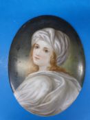 A large hand painted porcelain plaque wi
