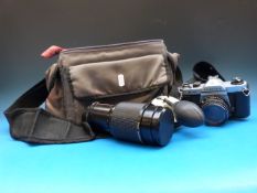 A Pentax Asahi K1000 camera in case with
