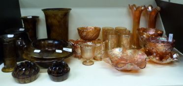 A collection of orange carnival glass an