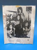 An early black and white photograph of Q