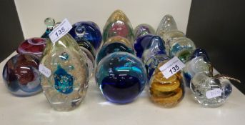 Twenty seven glass paperweights to inclu