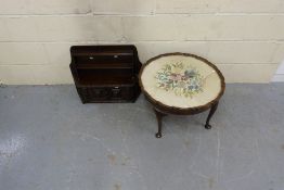 A mahogany side table with stumpwork und