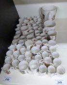 A collection of Goss tygs and loving cup