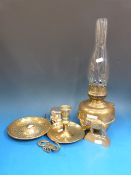 A 19thC brass ejector chamberstick, lamp