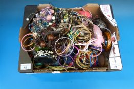 A large collection of bangles and bracel