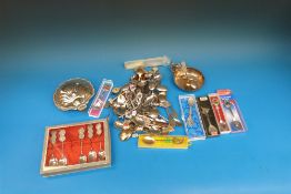 A quantity of collectors spoons, an oyst