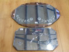 An oval Art Deco mirror with pink frame