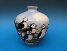 A Moorcroft vase in the Puffins pattern,