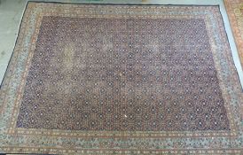 A large Persian wool carpet with all ove