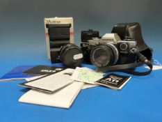 Olympus OM10 SLR camera together with Vi