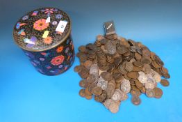 A tin biscuit barrel of largely English